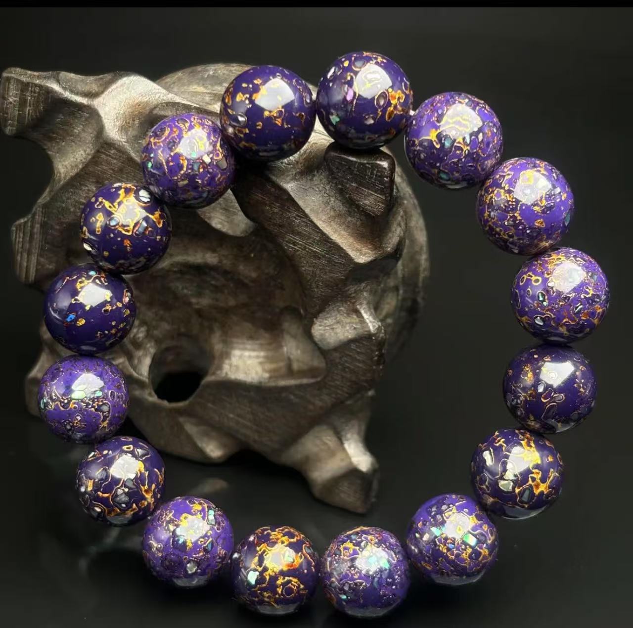 Samurai armor-inspired lacquer bangle with rosewood interior