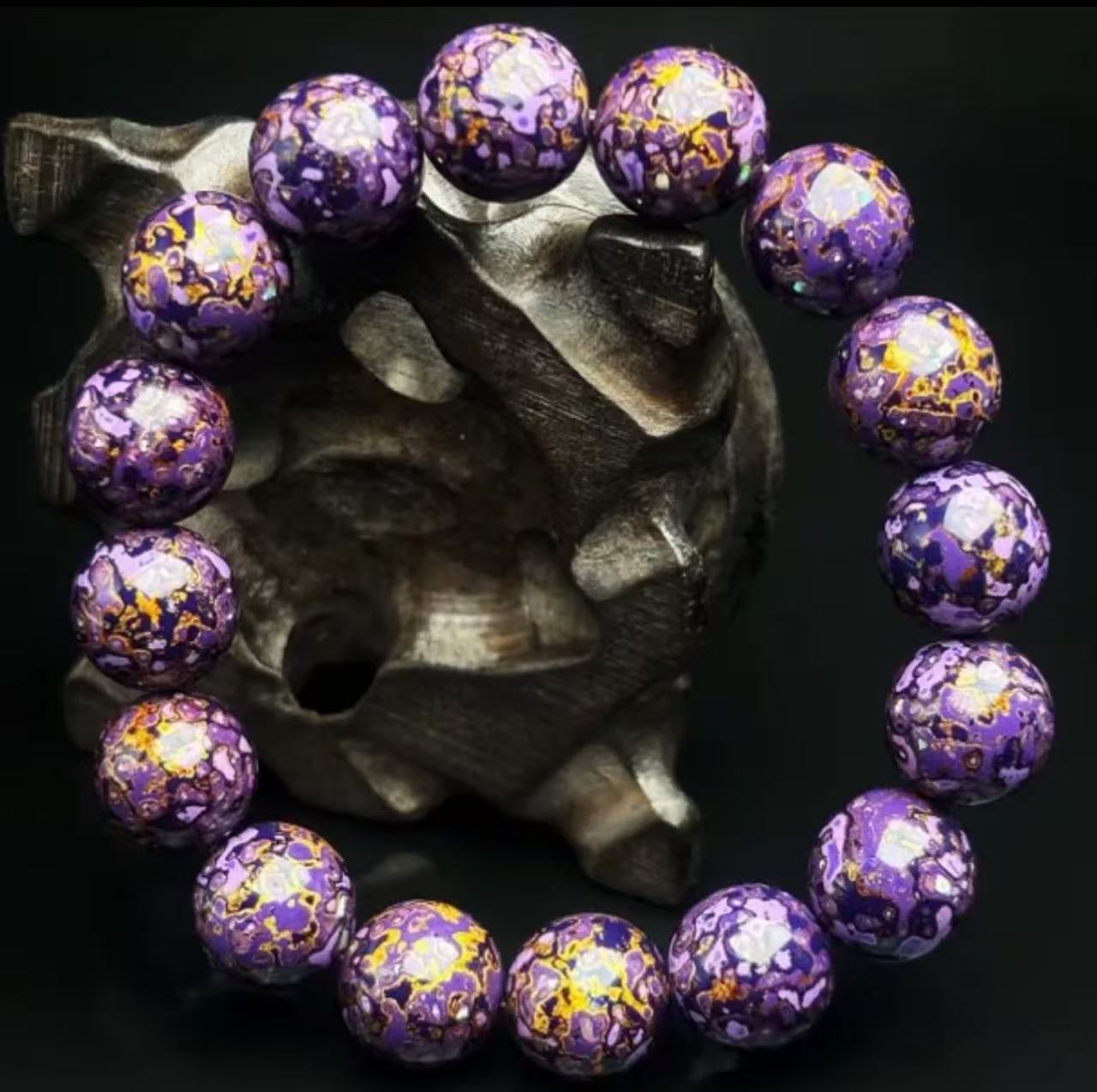 Abstract ink splash design on natural lacquer energy bracelet